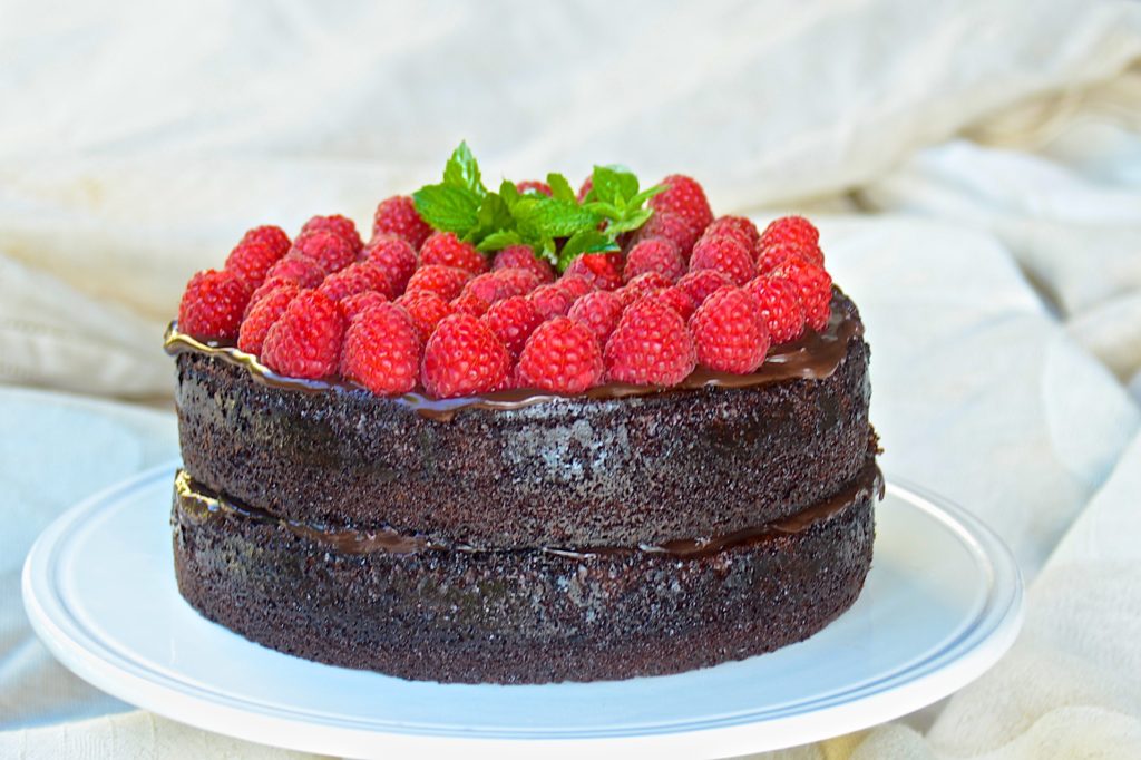 Chocolate cake with chocolate ganache and raspberries
