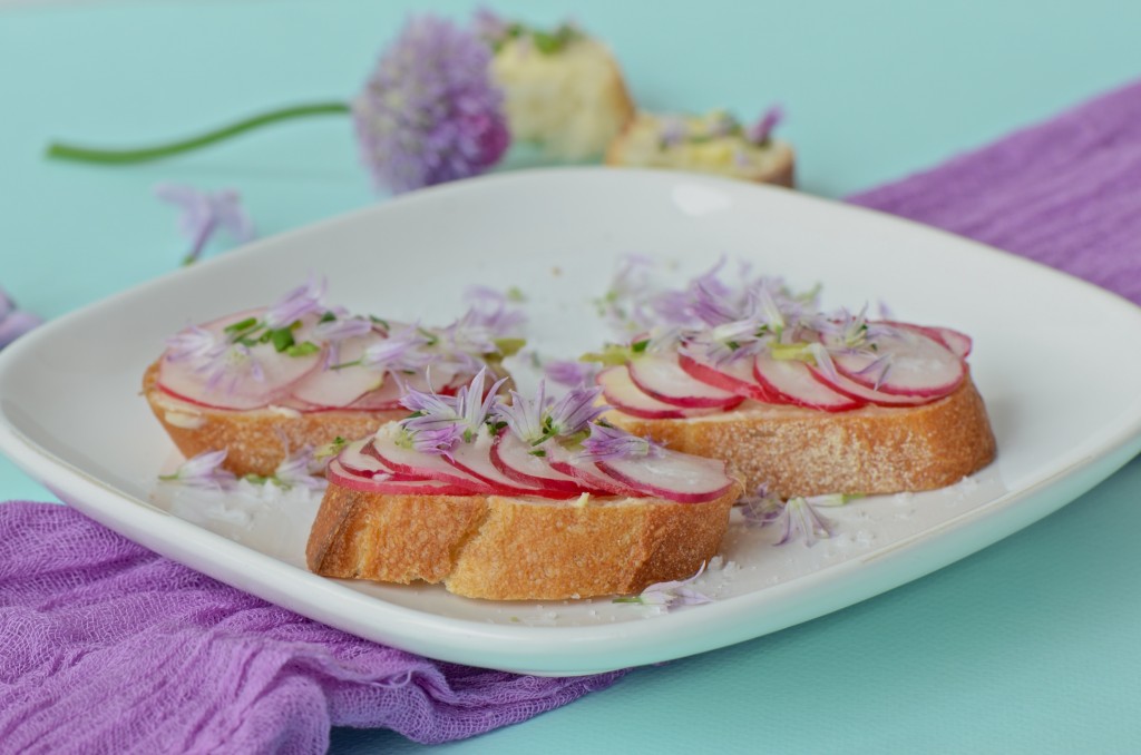 Radish and chive flower baguette slices