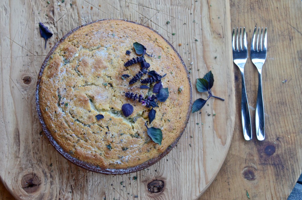 Olive oil cake with purple basil flowers