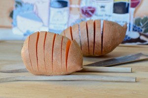 Cut the potatoes between two wooden spoons