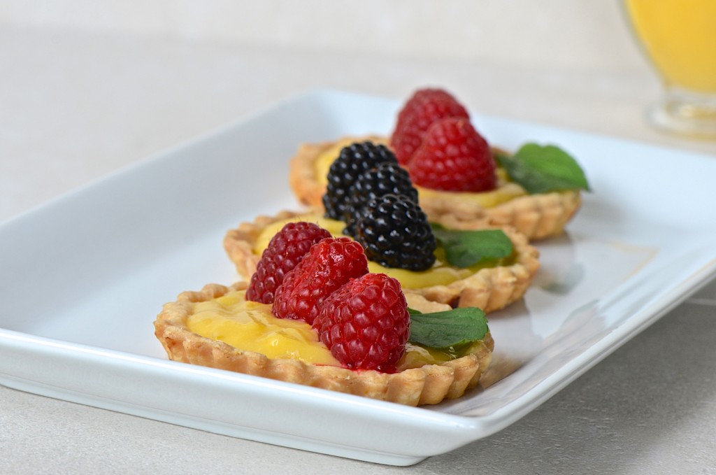 Lemon curd tarts with berries