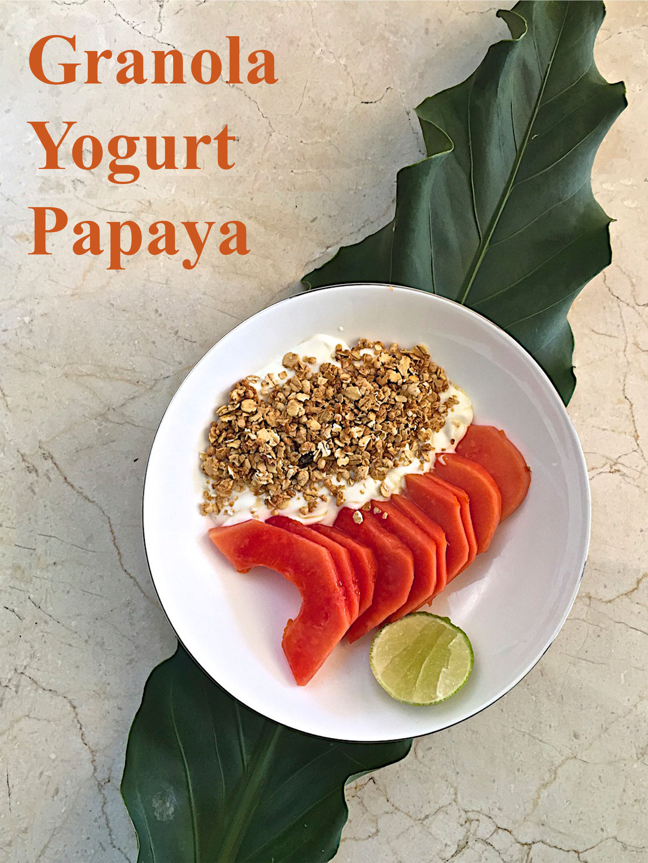 Granola, yogurt and papaya
